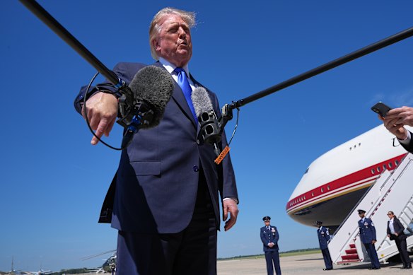 President Donald Trump talks before flying to Dallas.