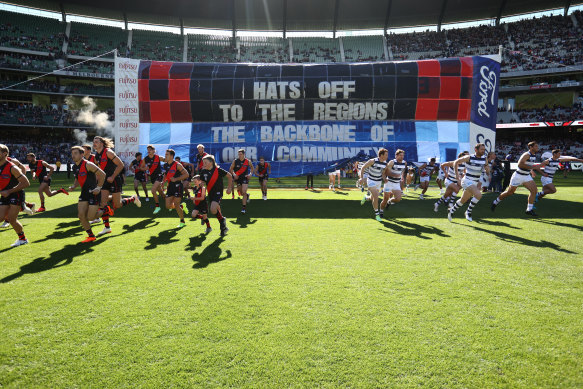 Essendon and Geelong run under united banner for Country Road.