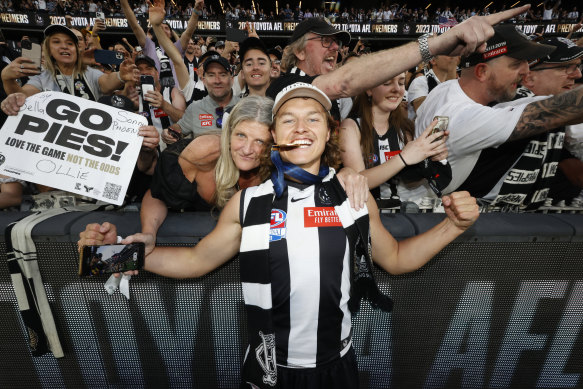 Jack Ginnivan celebrates Collingwood’s 2023 premiership.