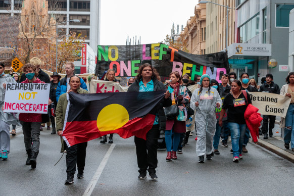 Protesters march against a plan to move 20 high-risk juvenile inmates out of Banksia Hill Juvenile Detention Centre to an adult maximum security prison.