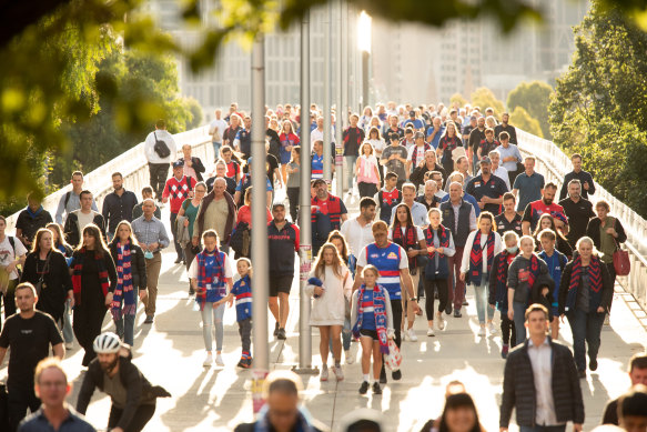 Crowds arrive at the MCG on Wednesday evening.