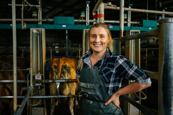 Tess Butler in the milking shed on her dairy farm in West Gippsland, Victoria. 