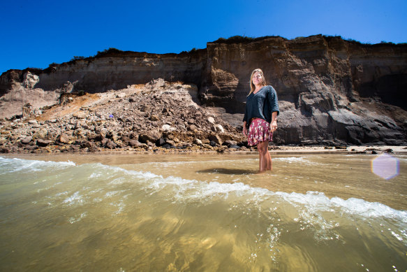 Surf Coast geologist Kim Straub at Addiscot Beach where cliffs have been crumbling. 