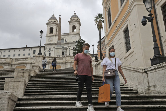 Visitors descend the Spanish Steps in Rome on Tuesday.