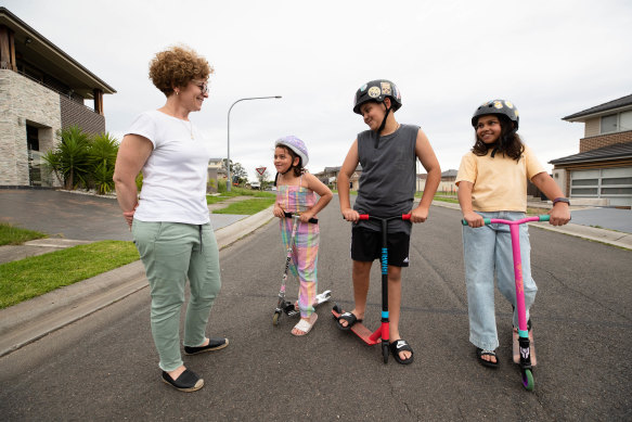 Marian Peters with her children, Emilio, 12, Estelle, 10, and Martina, 8, in Colyton.