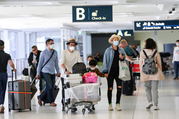New rules: Arriving travellers at Sydney International Airport on Sunday.