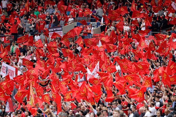 Manchester United supporters crowd the stands before the English FA Cup semifinal between Manchester United and Tottenham Hotspur at Wembley stadium in 2018 - this year, 4,000 supporters may be allowed to attend, subject to COVID tests. 