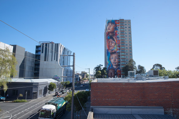 Matt Adnate’s earlier work: a 20-storey mural on one of Collingwood public housing highrises.