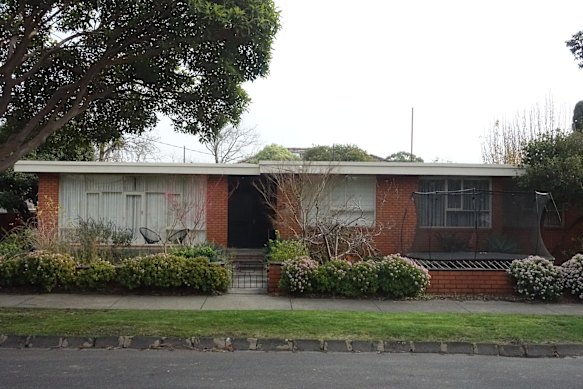 The original 1960s orange brick house.