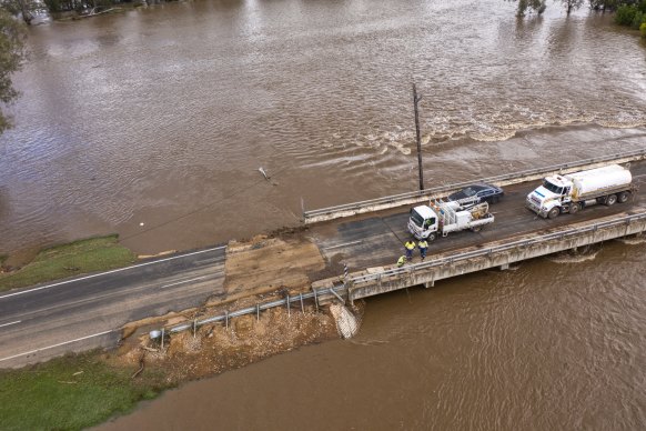 Road damage at Canowindra after flash flooding.