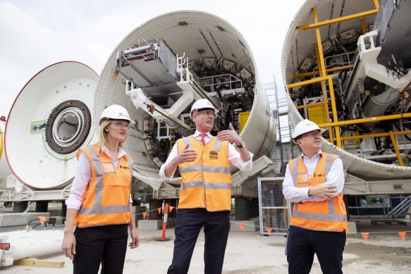 Premier Dominic Perrottet, centre, with Metropolitan Roads Minister Natalie Ward and Sydney Metro chief executive Peter Regan last week.