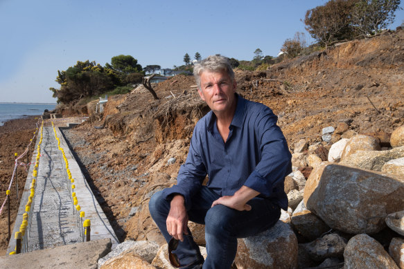 Gene Neill says he was building a seawall to stop erosion, but admits he didn’t have a permit.