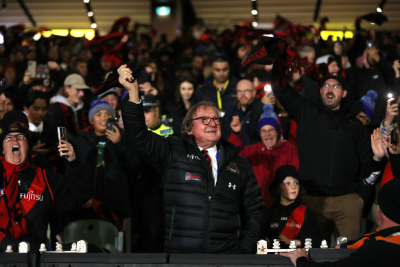 Kevin Sheedy.gets the Essendon faithful waving their scarves in celebration of their club. 