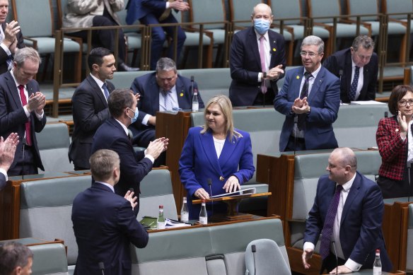 Member for Hughes Jenny Ware is congratulated by colleagues after delivering her first speech in the House of Representatives on Thursday. 
