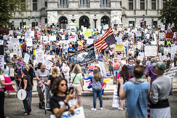 Protesters rally at the state capitol in Harrisburg, Pennsylvania, during the Day of Action protest against the Trump administration. 