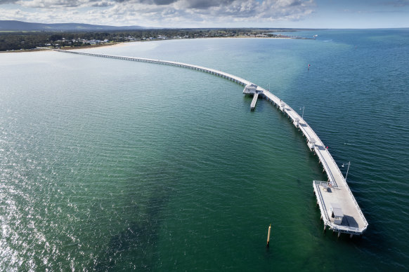 The exceptionally long jetty at Port Welshpool is popular with anglers. 