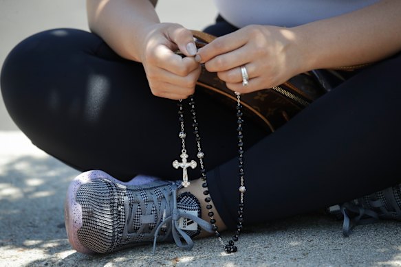 Saying the rosary prayers, with the aide memoire of beads, is a common Catholic practice during Lent.  