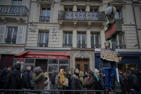 Demonstrators in front of a metro station in Paris.