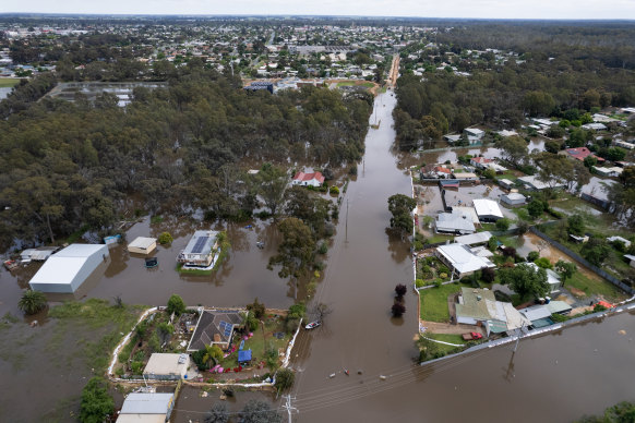 Dallas Mitchell’s house (bottom left) surrounded by water on Sunday.