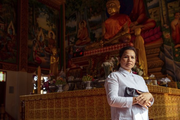 Registered nurse Srey Kang films COVID-19 updates in Khmer for her local community at Bonnyigg Temple.