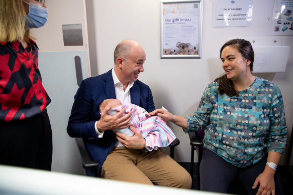 Treasurer Matt Kean speaks with new mother Natascha Flowers at the Royal Hospital for Women on Sunday.