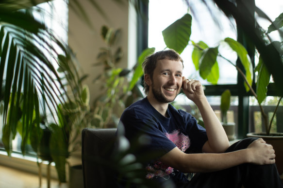 Daniel Minton at home with his plants.