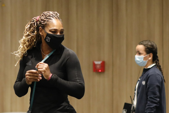 Serena Williams leaves her media conference after announcing her withdrawal from the French Open.