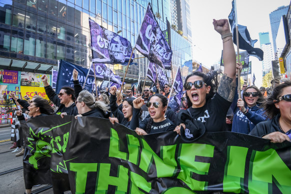 CFMEU members walk through the Melbourne CBD during the union movement’s second major protest in the wake of the administration of the CFMEU. 