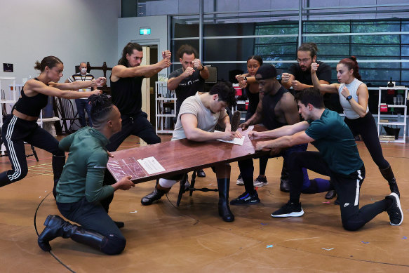 Jason Arrow (centre) and members  of the Australian cast of Hamilton during rehearsals in Sydney in 2021.