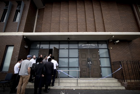 People inspecting the damage at the Adass Israel synagogue in Ripponlea. 