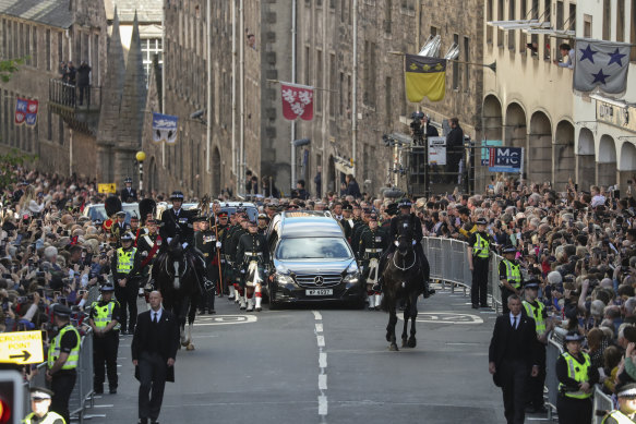 The procession taking the Queen’s coffin up Edinburgh’s Royal Mile to St Giles’ Cathedral.