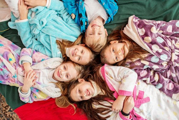 Consider an “everything but the sleep” sleepover, where the kids stay up late, have a midnight snack, then return home to sleep.