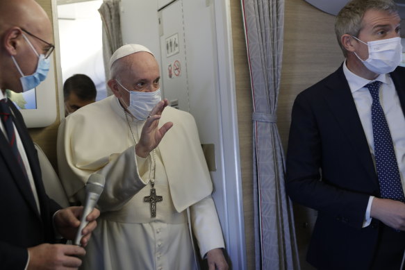 Pope Francis speaks to journalists aboard the plane heading to Iraq.