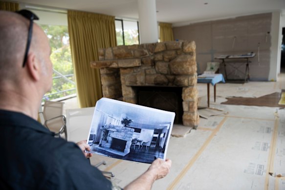 Brian Seidler at Julian Rose House  in 2020, examining some old images of the house. 