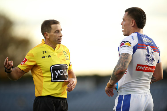 Referee Ben Cummins speaks to David Klemmer at Campbelltown Stadium.