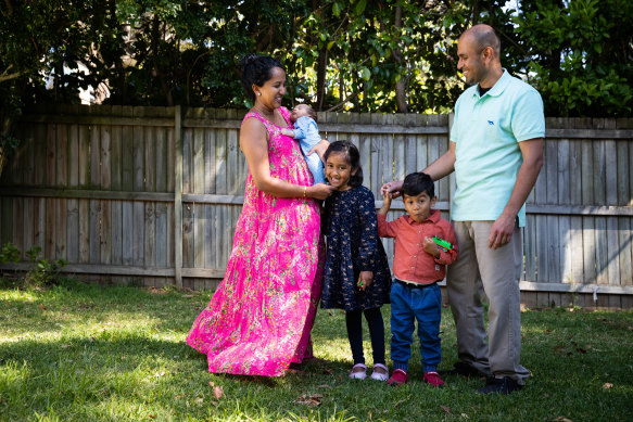 Shameela Karunakaran and Julian Rayappu and their three children, aged 5, 3 and 1. Ms Karunakaram underwent IVF to have her children. 