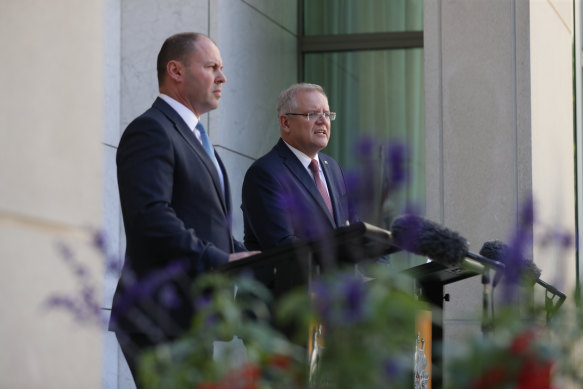 Treasurer Josh Frydenberg and Prime Minister Scott Morrison address the media on Friday.