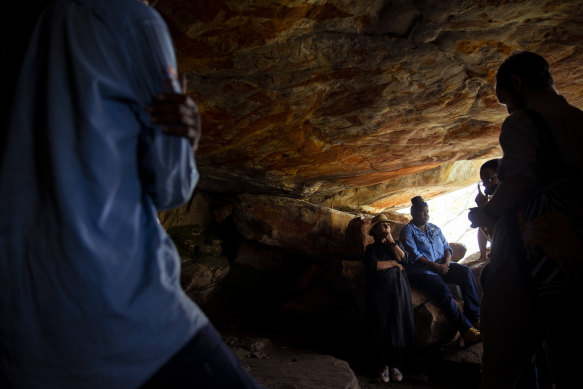 Linda Burney visits a rock painting site with Anindilyakwa Land & Sea Rangers on Groote Eyland