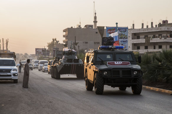 Russian forces patrol in the city of Amuda, north Syria, on October 24.
