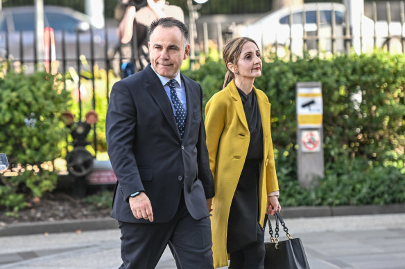 Pesutto and wife Betty arrive at the state funeral for Father Bob Maguire at St Patrick’s Cathedral on Friday.
