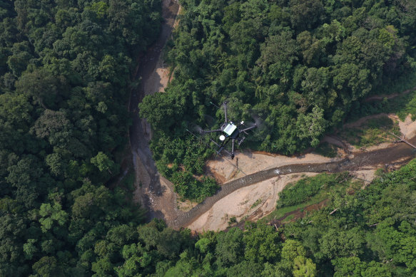 A drone hovering over the Vietnamese rainforest. 