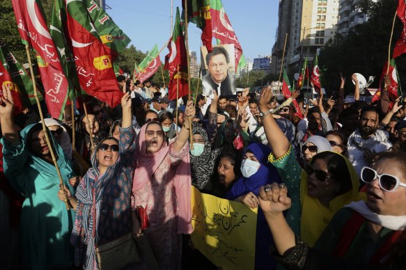 Supporters of former Pakistani prime minister Imran Khan’s party condemn a November shooting incident on their leader’s convoy in Karachi last year.