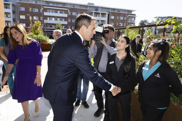 Treasurer  Jim Chalmers and Minister for Aged Care Anika Wells speak with employees at Goodwin Village in Canberra following the announced aged care worker payrise.