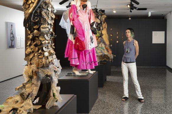 Marina DeBris with some of her work, exhibited at the Maritime Museum, Darling Harbour.