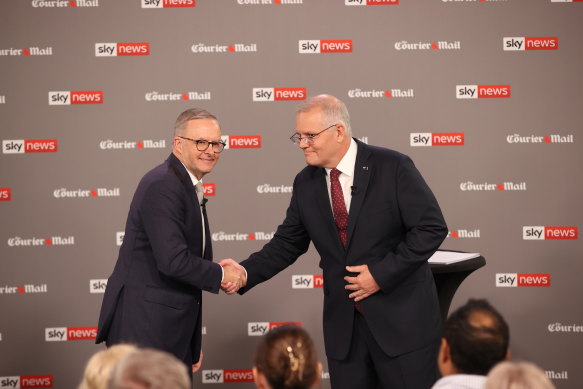 Morrison and Albanese shake hands at the first leaders’ debate at Sky News.