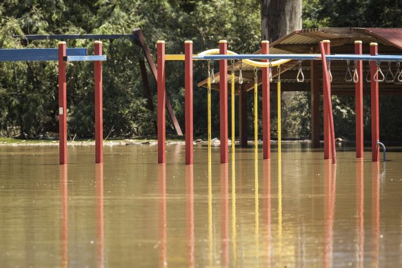 Submerged play equipment at the Goulburn River Caravan Park in Seymour.