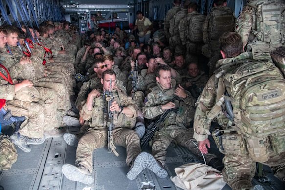 UK military personnel onboard a plane departing Kabul in late August 2021.