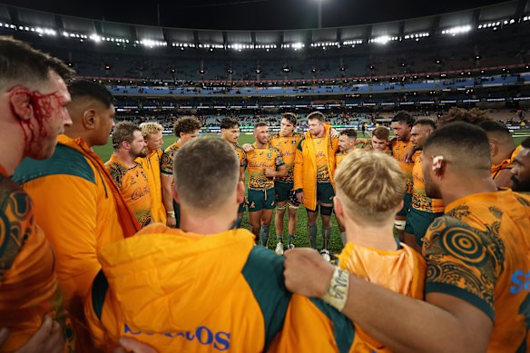 Quade Cooper addresses the Wallabies following a loss to the All Blacks at the MCG in 2023.