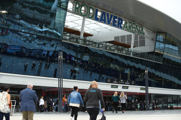 Members of the public arrive at the state memorial at Rod Laver Arena.