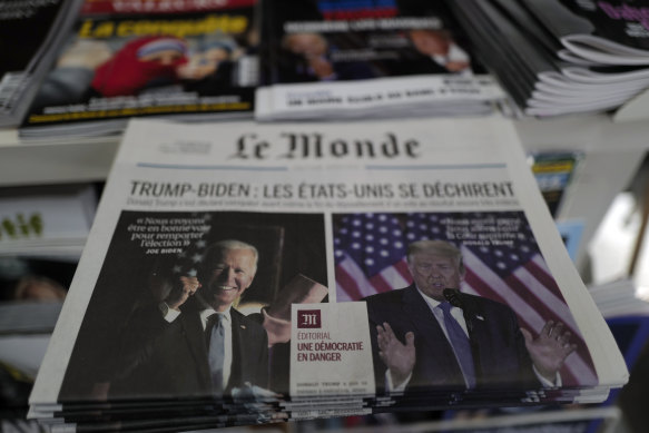 French newspaper Le Monde led with "Trump-Biden : the United States is tearing itself apart, Editorial : a democracy in danger".